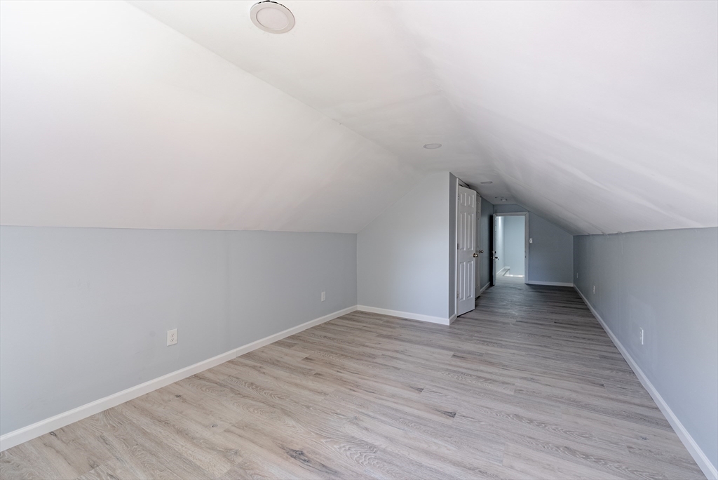 126 Lancaster Avenue West Springfield, MA 01089 - Photo 30 of 35 a view of an empty room with wooden floor