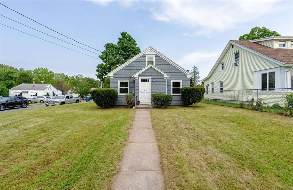 126 Lancaster Avenue West Springfield, MA 01089 - Photo 5 of 35 a view of a house with a garden