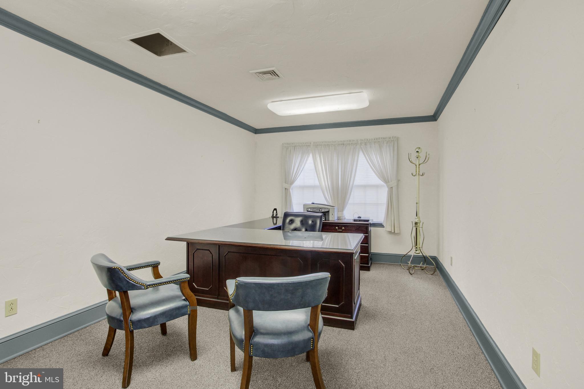 209 Broadway Hanover, PA 17331 - Photo 13 of 28 a dining room with furniture and window