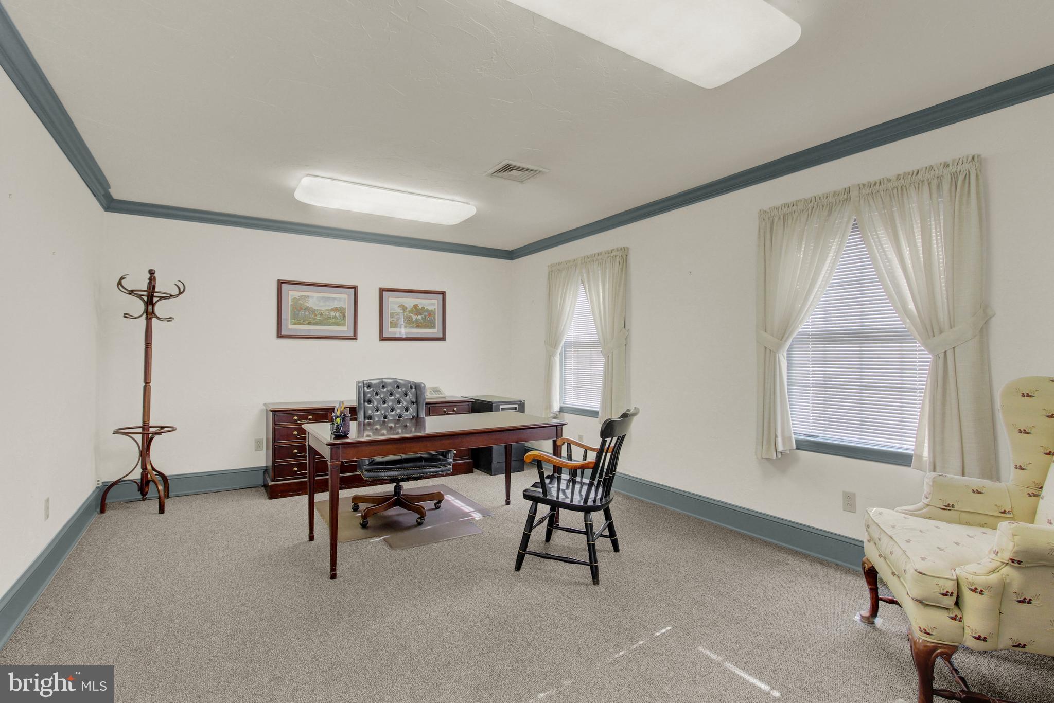 209 Broadway Hanover, PA 17331 - Photo 14 of 28 a view of a workspace with furniture and a window