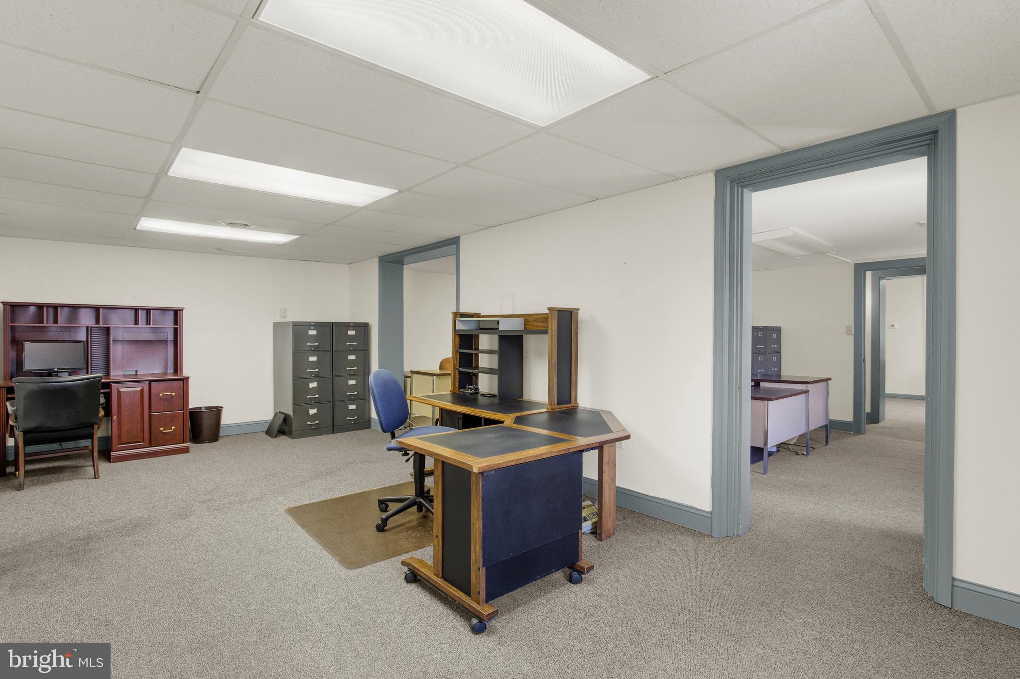209 Broadway Hanover, PA 17331 - Photo 21 of 28 a livingroom with furniture and a flat screen tv