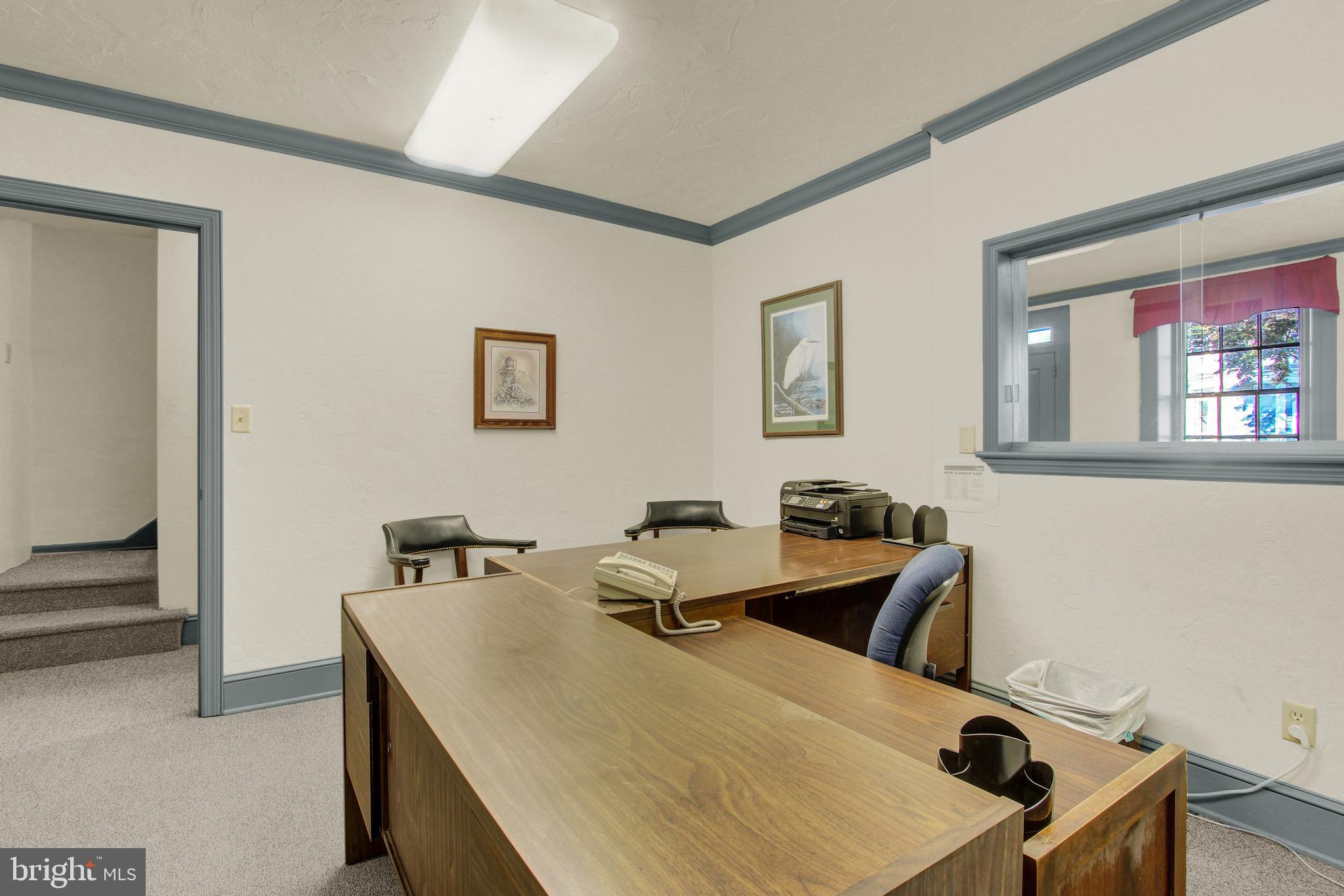 209 Broadway Hanover, PA 17331 - Photo 8 of 28 a room with table and chair