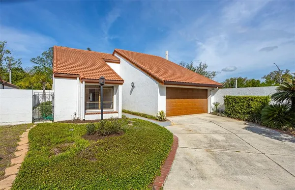 a house view with a garden space