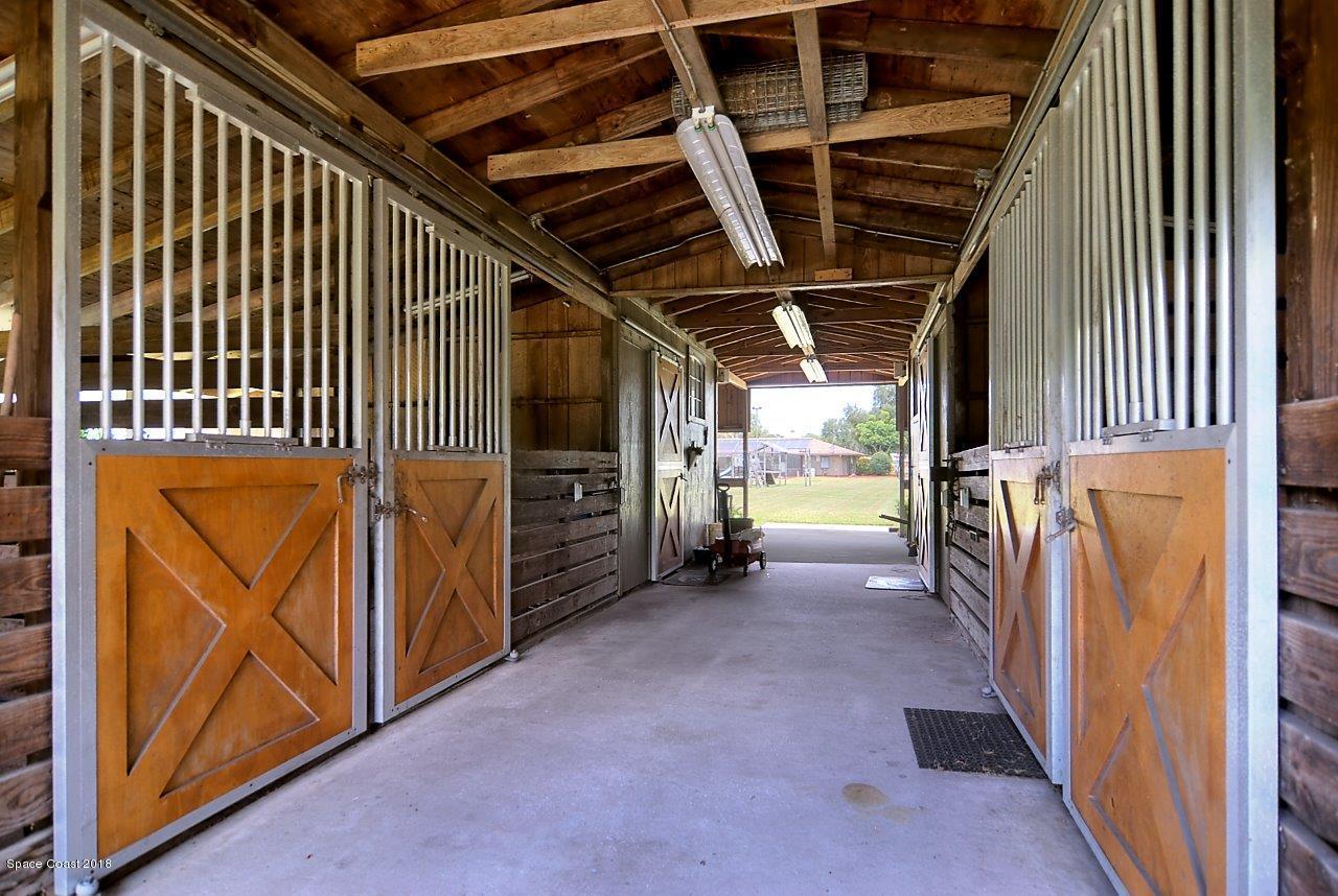 4107 Pinewood Road Melbourne, FL 32934 - Photo 12 of 32 a view of a storage room