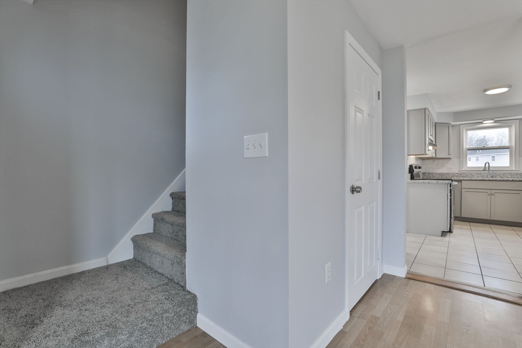 5 Norman Drive, Unit R Derry, NH 03038 - Photo 15 of 28 a view of a hallway with kitchen and entryway