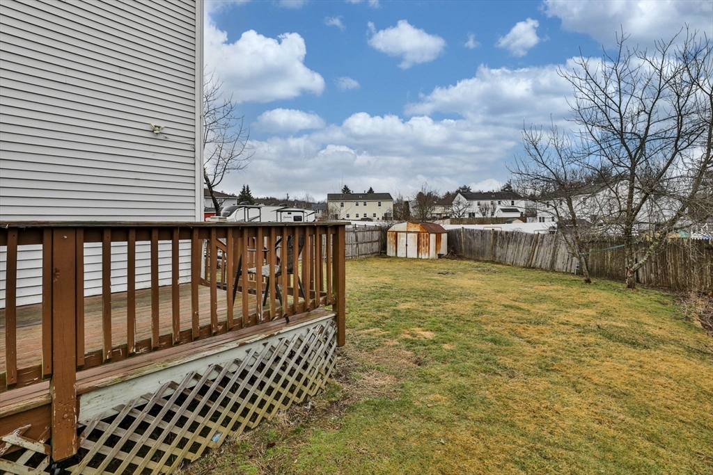 5 Norman Drive, Unit R Derry, NH 03038 - Photo 25 of 28 a view of a swimming pool with a deck