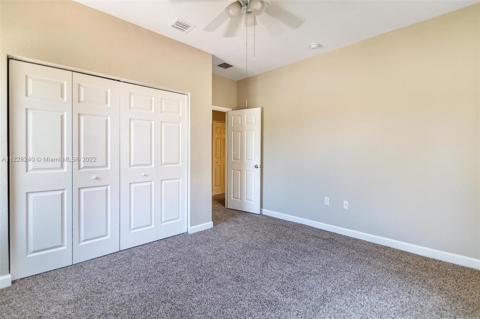 11451 Southwest 243 Terrace Homestead, FL 33032 - Photo 21 of 49 a view of an empty room