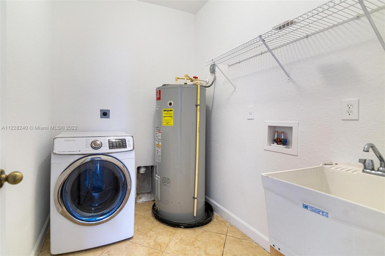 11451 Southwest 243 Terrace Homestead, FL 33032 - Photo 23 of 49 a utility room with dryer and washer