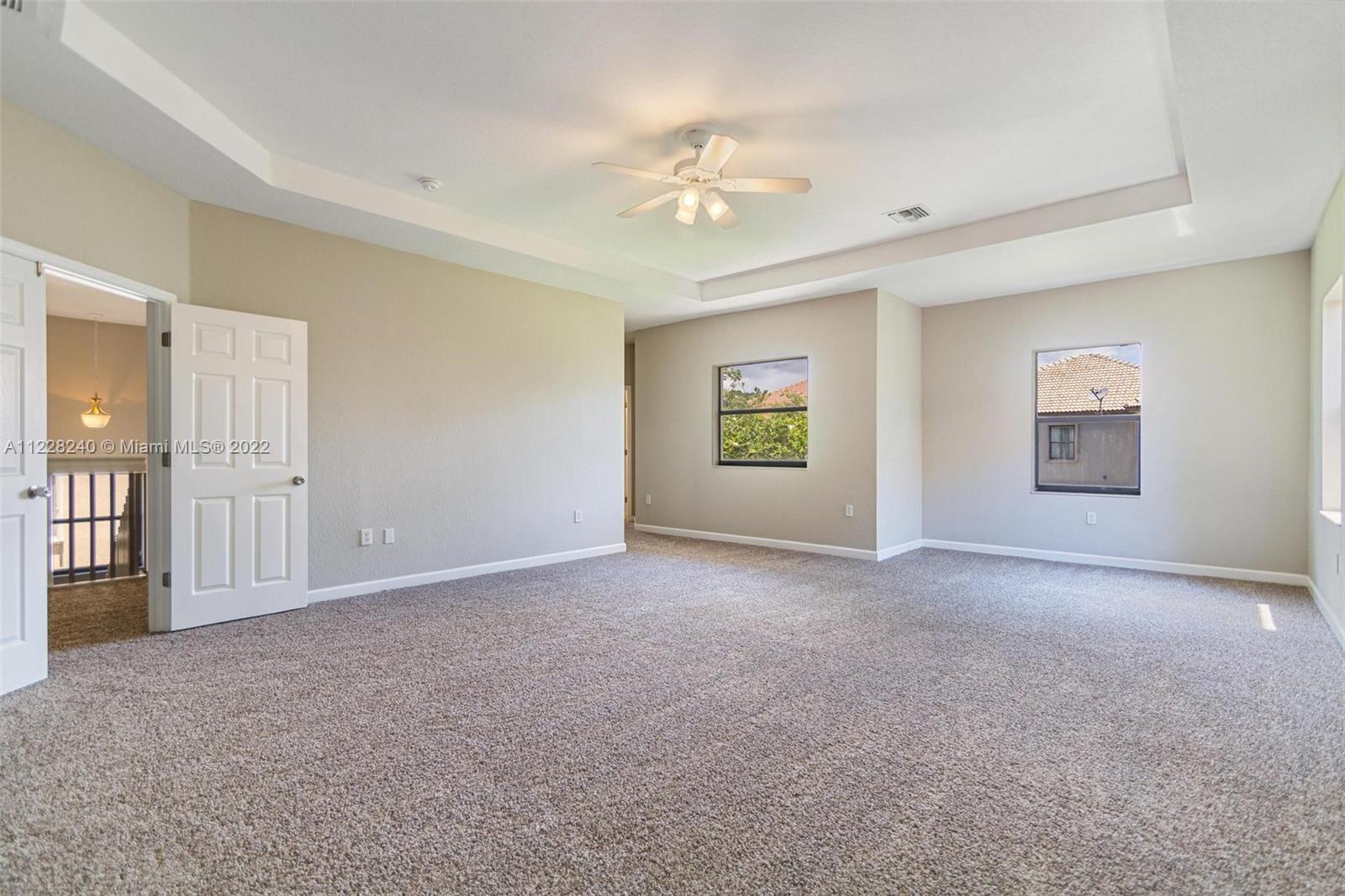 11451 Southwest 243 Terrace Homestead, FL 33032 - Photo 27 of 49 a view of an empty room with a window