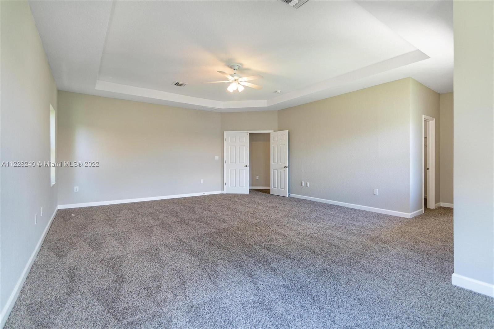 11451 Southwest 243 Terrace Homestead, FL 33032 - Photo 29 of 49 a view of an empty room