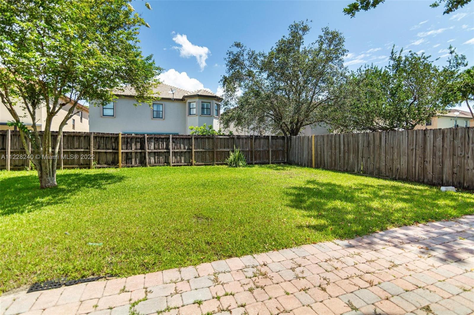 11451 Southwest 243 Terrace Homestead, FL 33032 - Photo 35 of 49 a view of a backyard with a small cabin