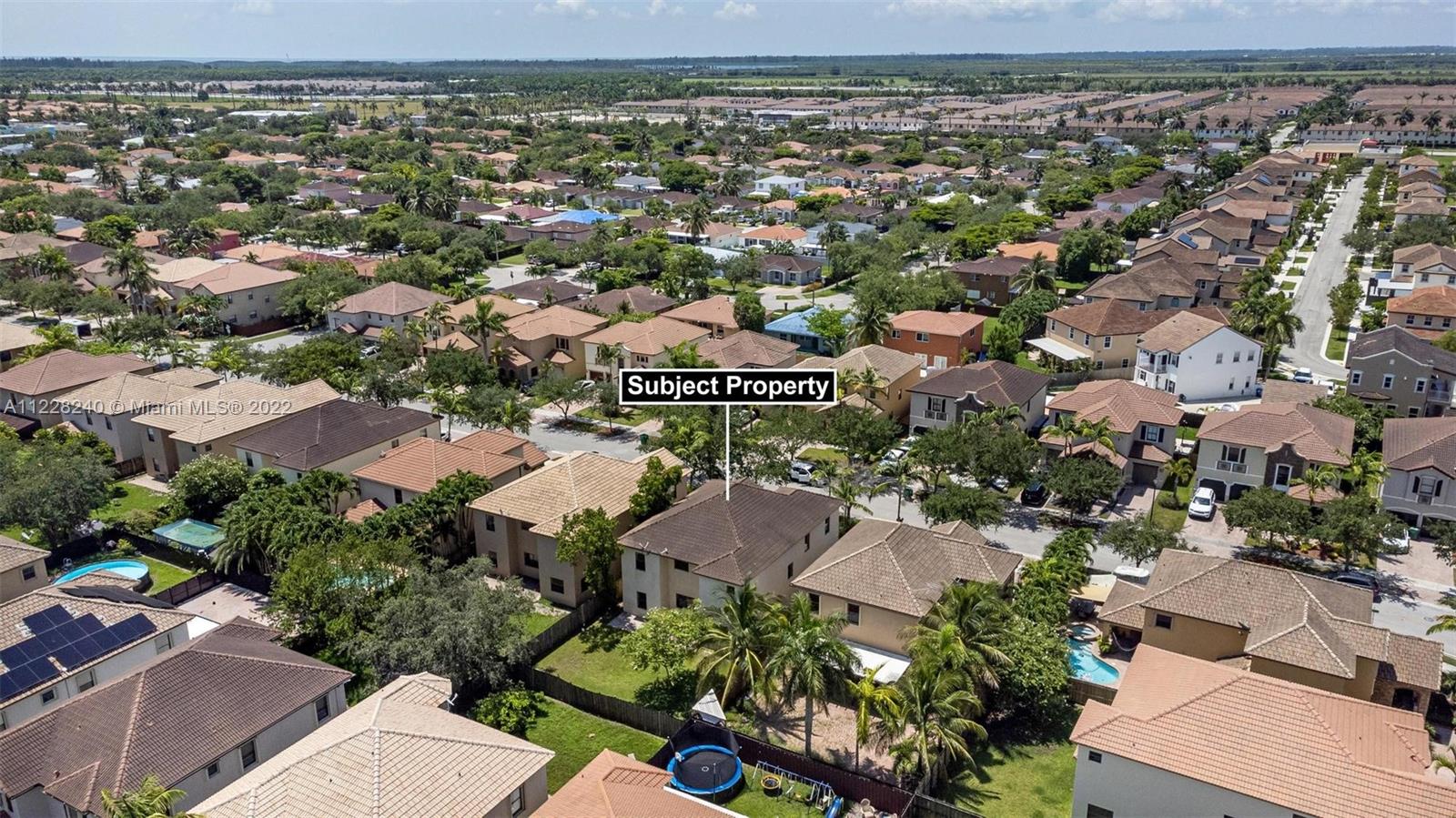 11451 Southwest 243 Terrace Homestead, FL 33032 - Photo 43 of 49 an aerial view of a city with lots of residential buildings