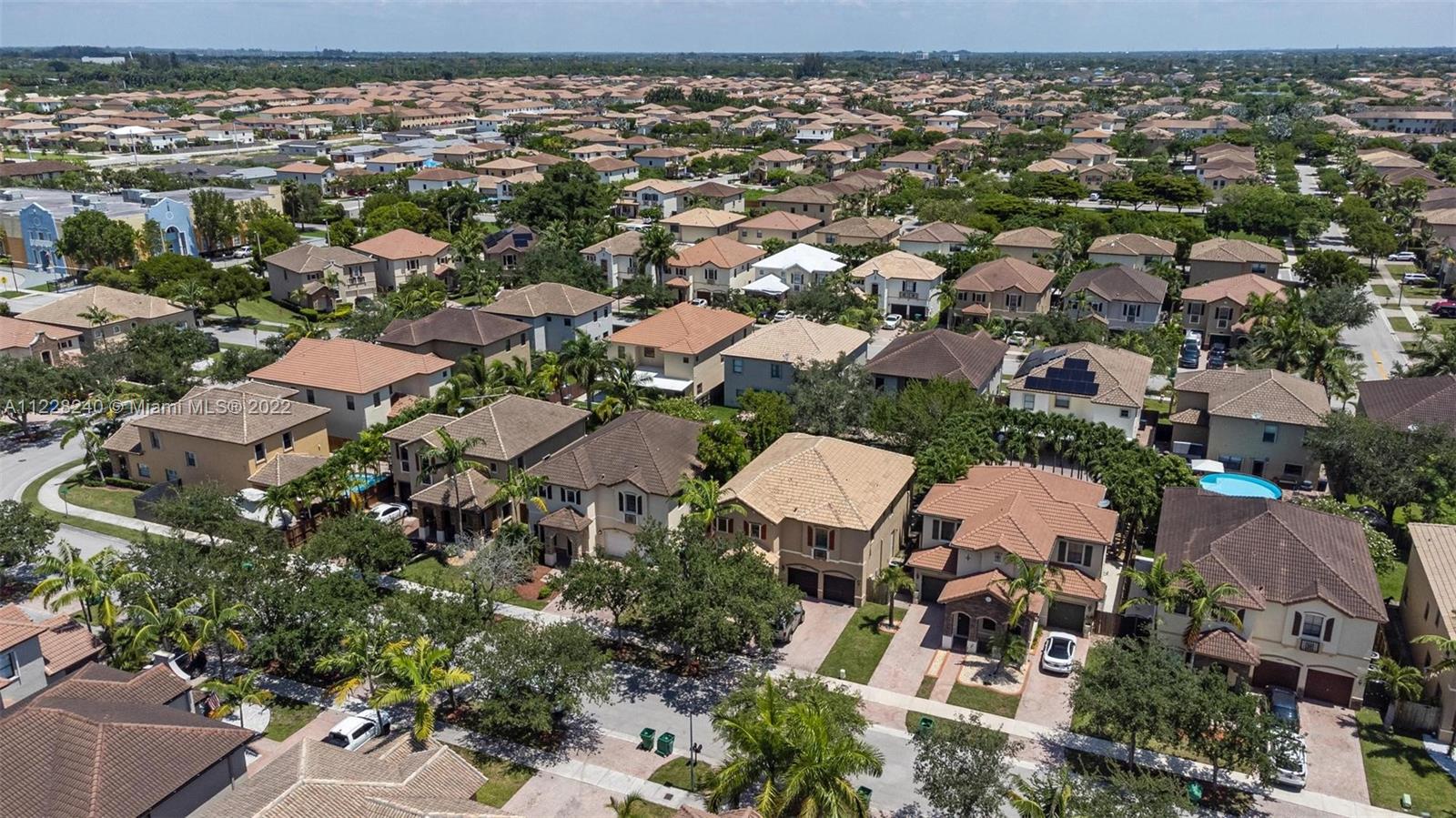 11451 Southwest 243 Terrace Homestead, FL 33032 - Photo 48 of 49 an aerial view of residential houses with outdoor space