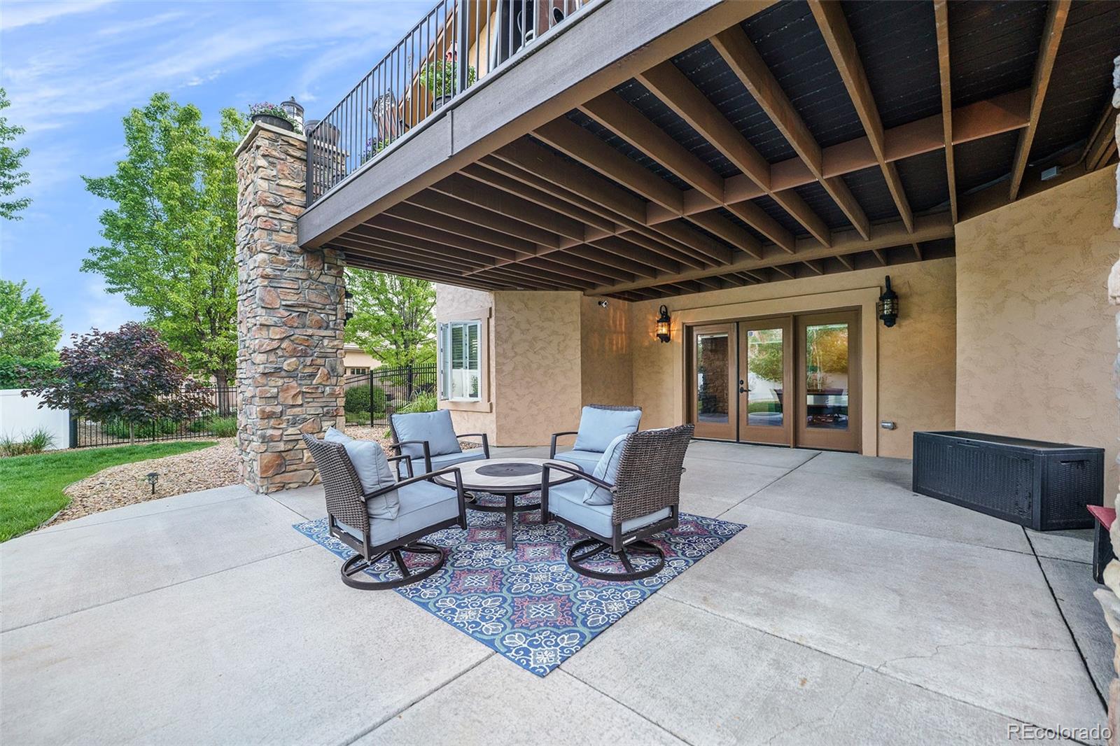 5792 Yank Street Arvada, CO 80002 - Photo 37 of 40 a building outdoor space with patio furniture