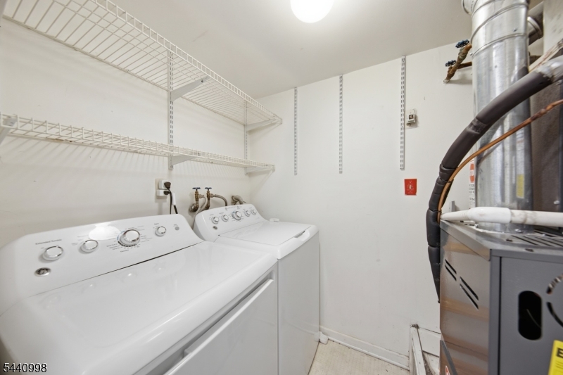 609 Mark Twain Way Mahwah, NJ 07430 - Photo 23 of 40 a utility room with dryer and washer