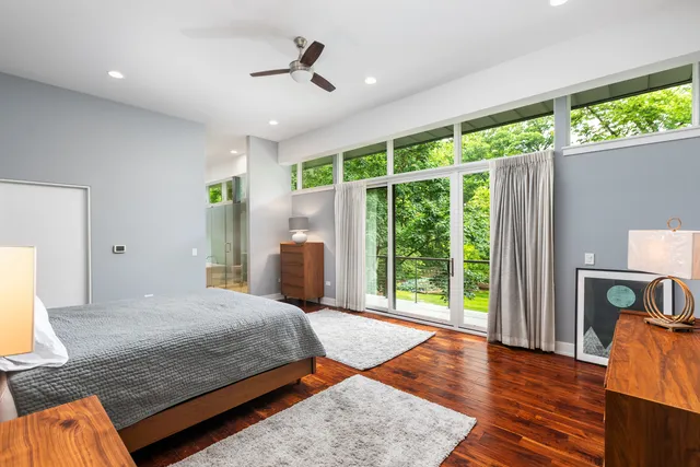 a white bath tub sitting next to a white toilet