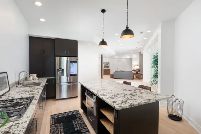 a bathroom with a sink a mirror and vanity