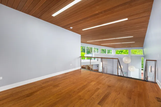 a view of a house with a yard porch and sitting area