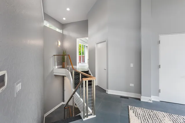 a front view of house with a garden