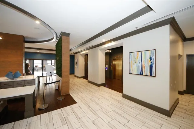 a view of a living room with a wooden floor