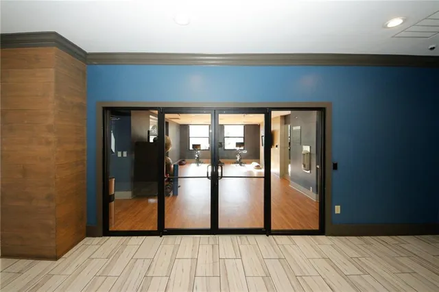 a view of a room has wooden floor