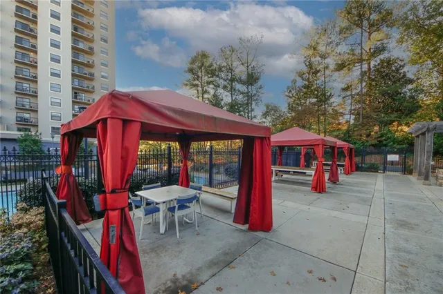 a view of a cafe with sitting area