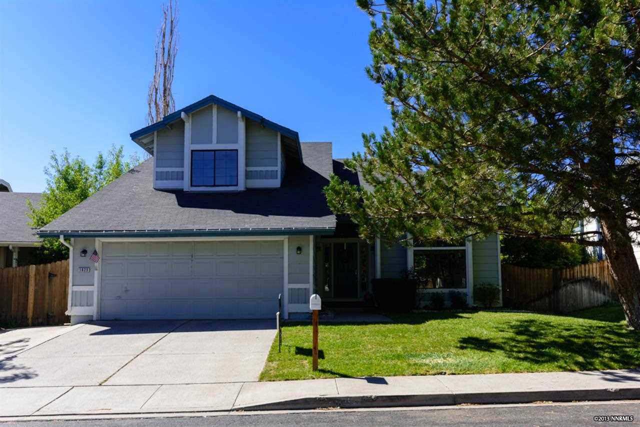 1825 Fox Run Road Reno, NV 89523 - Photo 1 of 1 a front view of a house with a garden