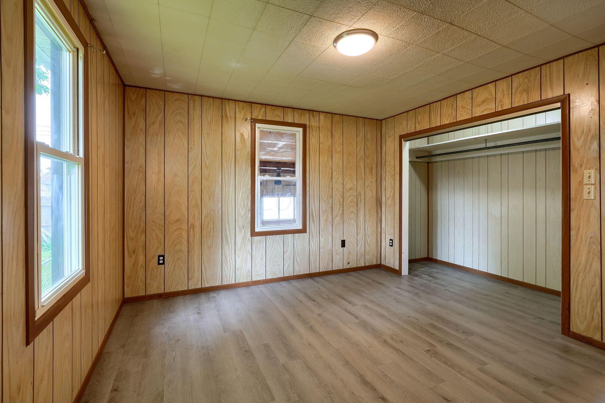 40 Delray Road Columbus, OH 43207 - Photo 24 of 53 Primary bedroom also has views into the 4 season room and a west facing window.