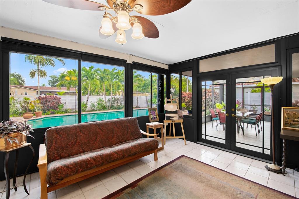 4700 Grant Street Hollywood, FL 33021 - Photo 14 of 32 a living room with furniture and a large window