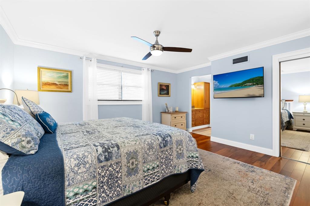 4700 Grant Street Hollywood, FL 33021 - Photo 15 of 32 a bedroom with a bed and a dresser