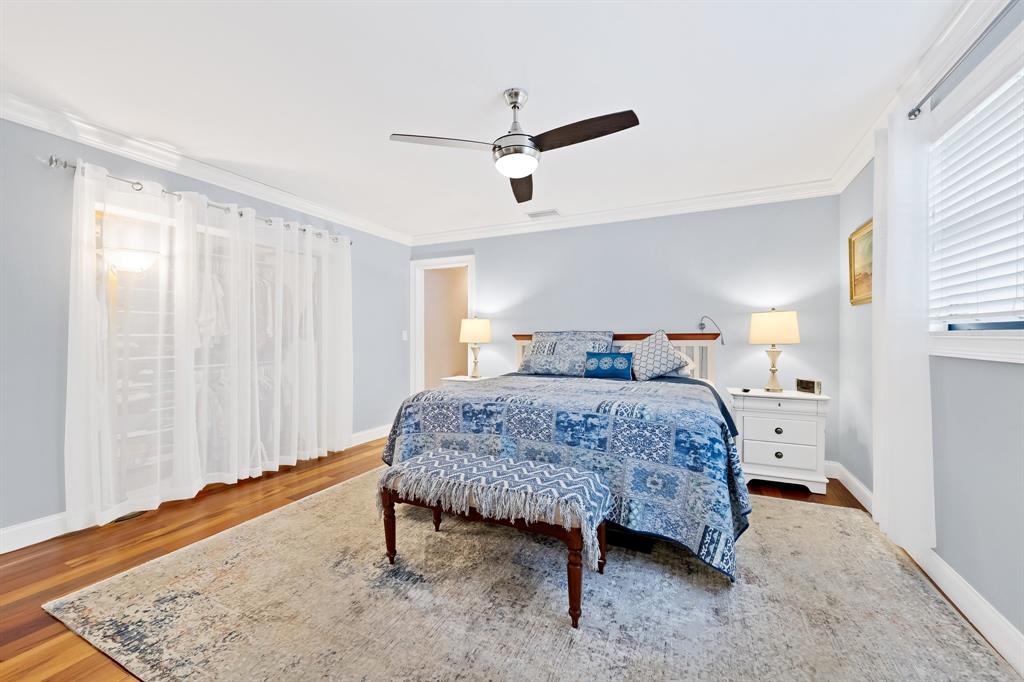 4700 Grant Street Hollywood, FL 33021 - Photo 16 of 32 a bedroom with a bed and wooden floor