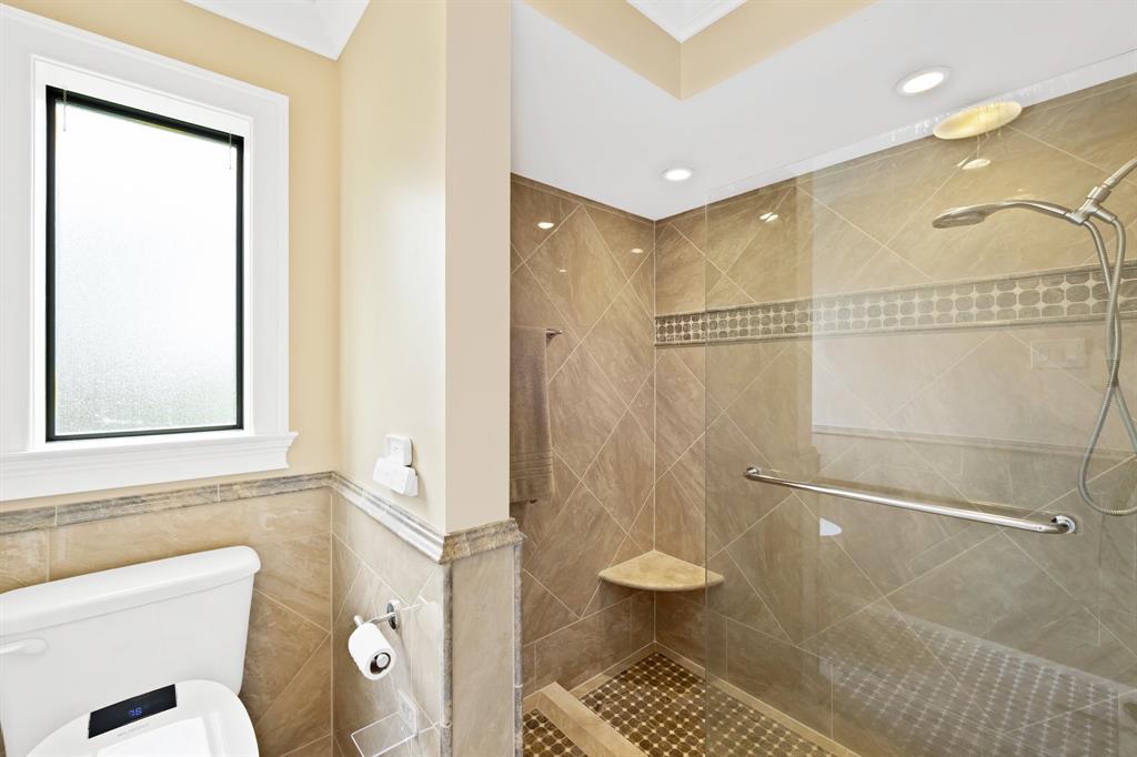 4700 Grant Street Hollywood, FL 33021 - Photo 18 of 32 a bathroom with a shower and a toilet