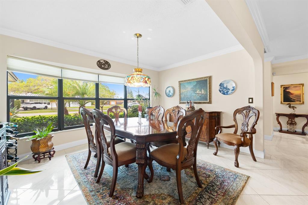 4700 Grant Street Hollywood, FL 33021 - Photo 5 of 32 a view of a dining room with furniture window and outside view