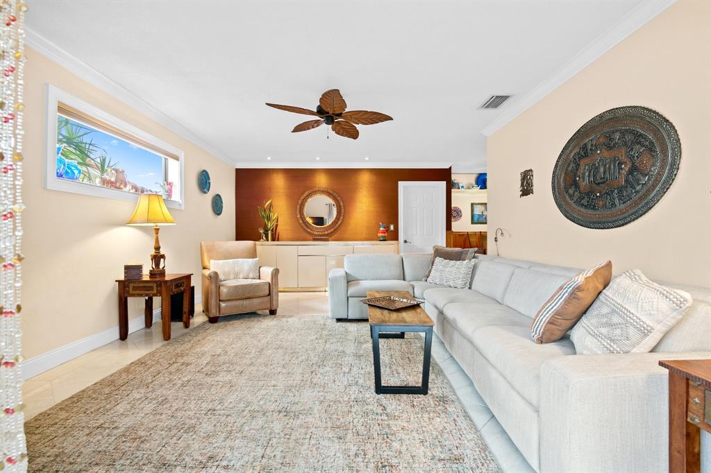 4700 Grant Street Hollywood, FL 33021 - Photo 10 of 32 a living room with furniture and a large window