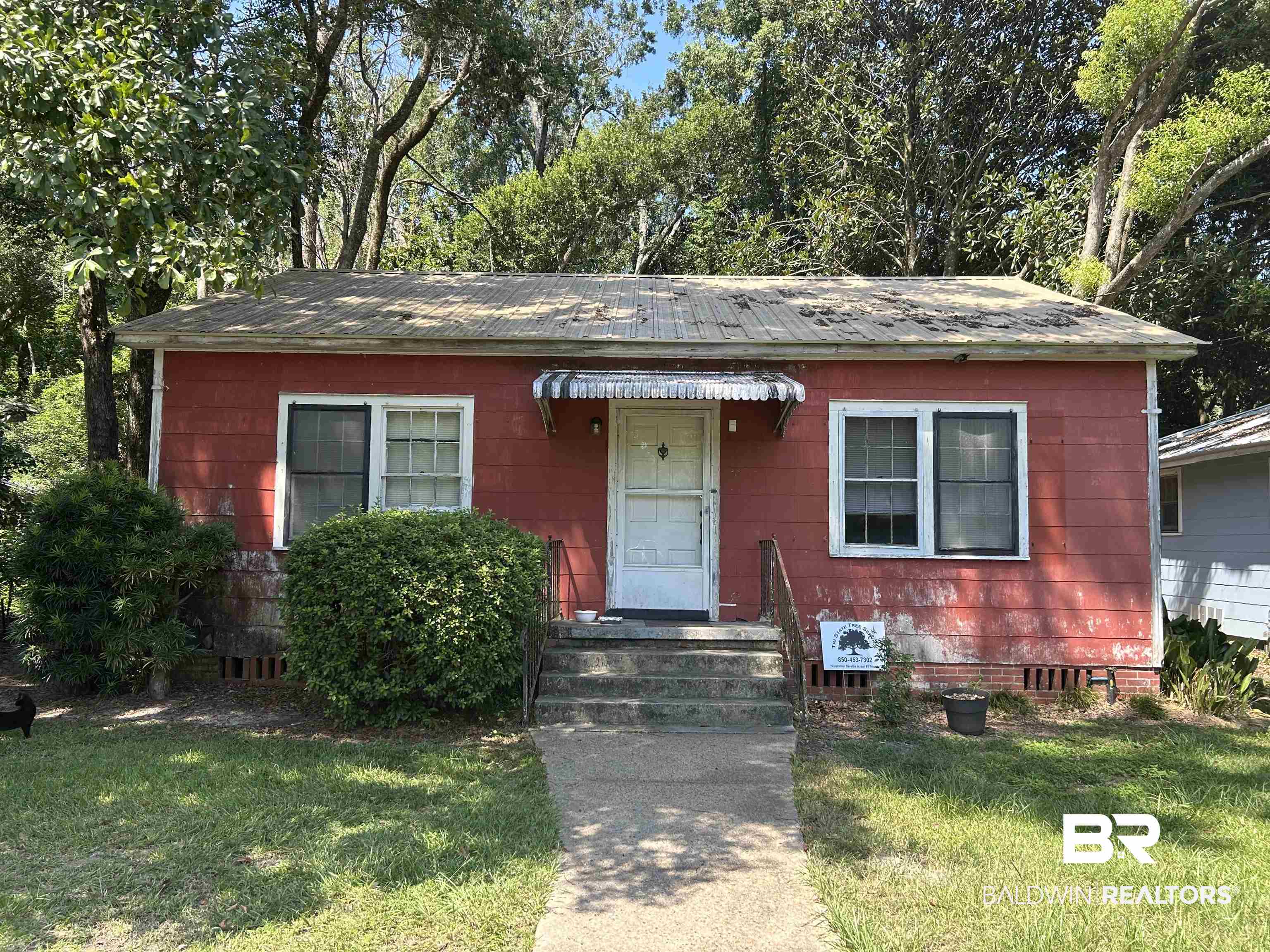 602 Morgan Avenue Mobile, AL 36606 - Photo 1 of 1 View of front of home featuring a front yard