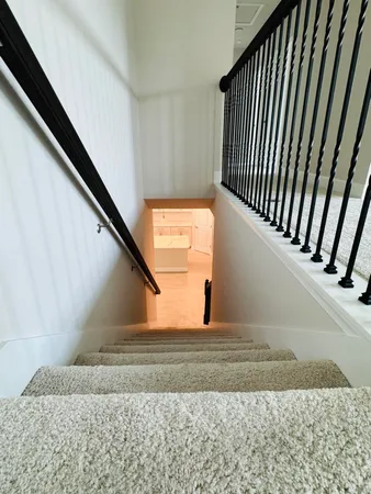 a view of a hallway with windows