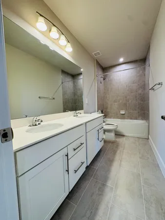 a bathroom with a white bath tub