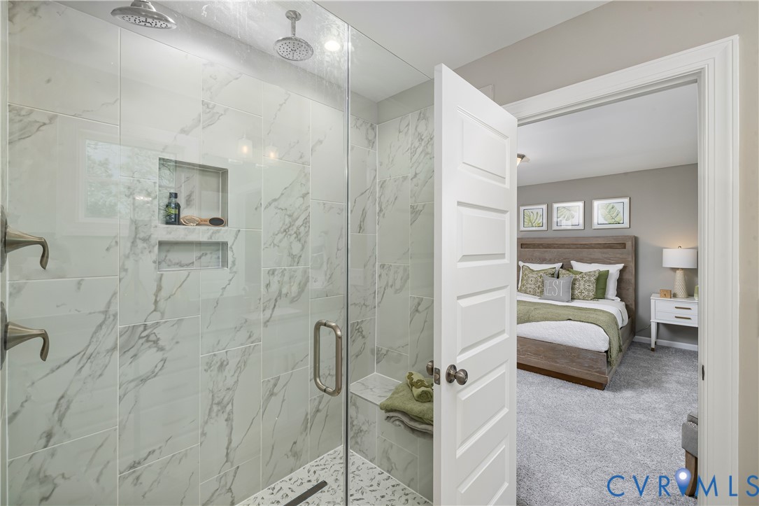 17348 Alana Drive Moseley, VA 23120 - Photo 18 of 36 a en suite bathroom with a sink and a shower