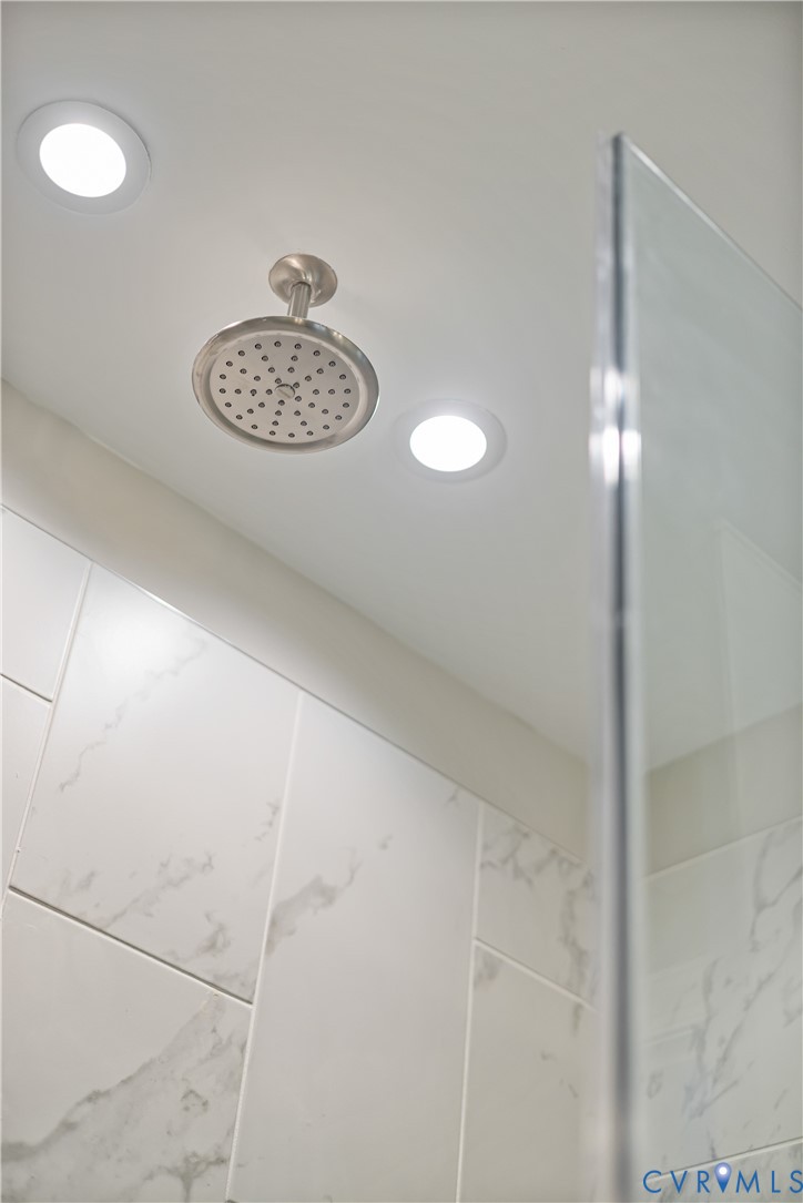 17348 Alana Drive Moseley, VA 23120 - Photo 19 of 36 a view of a hallway with a chandelier