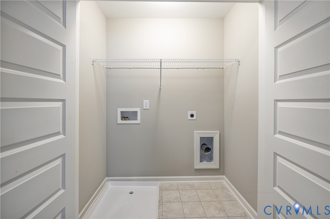 17348 Alana Drive Moseley, VA 23120 - Photo 26 of 36 a view of an empty walk in closet