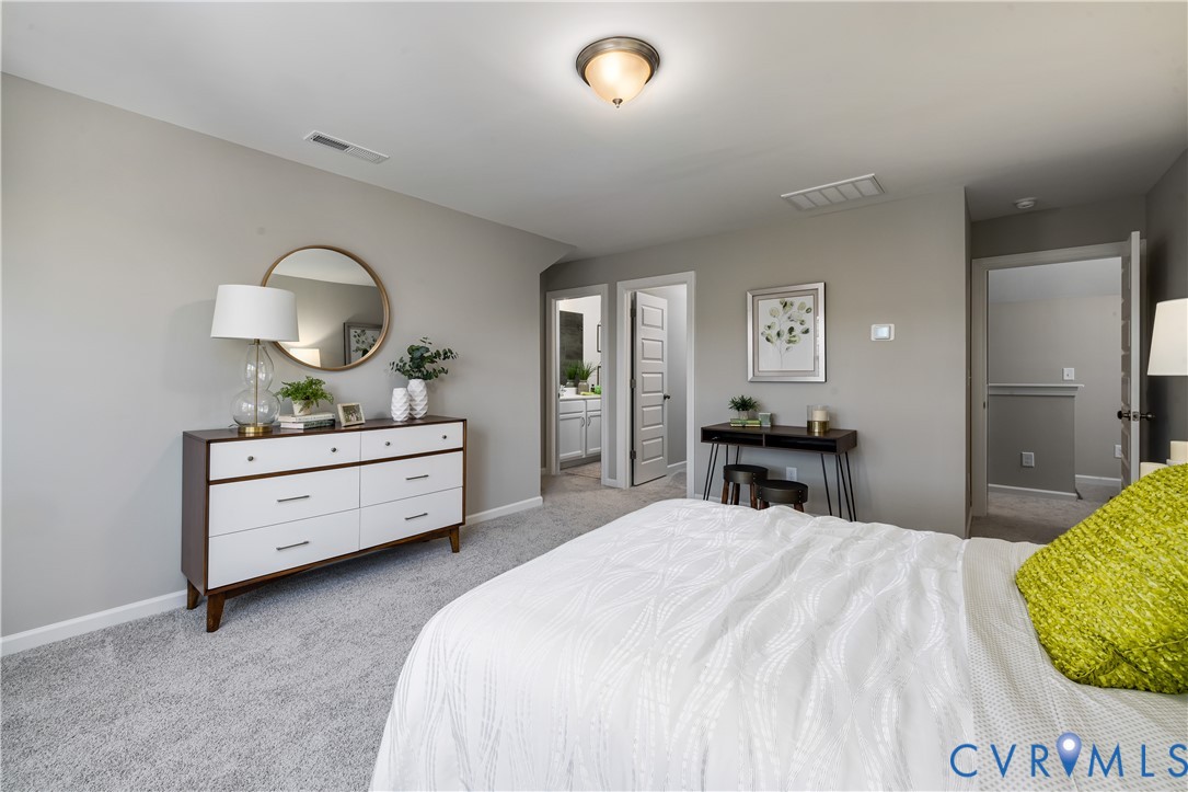 17348 Alana Drive Moseley, VA 23120 - Photo 31 of 36 a bedroom with a bed and a dresser