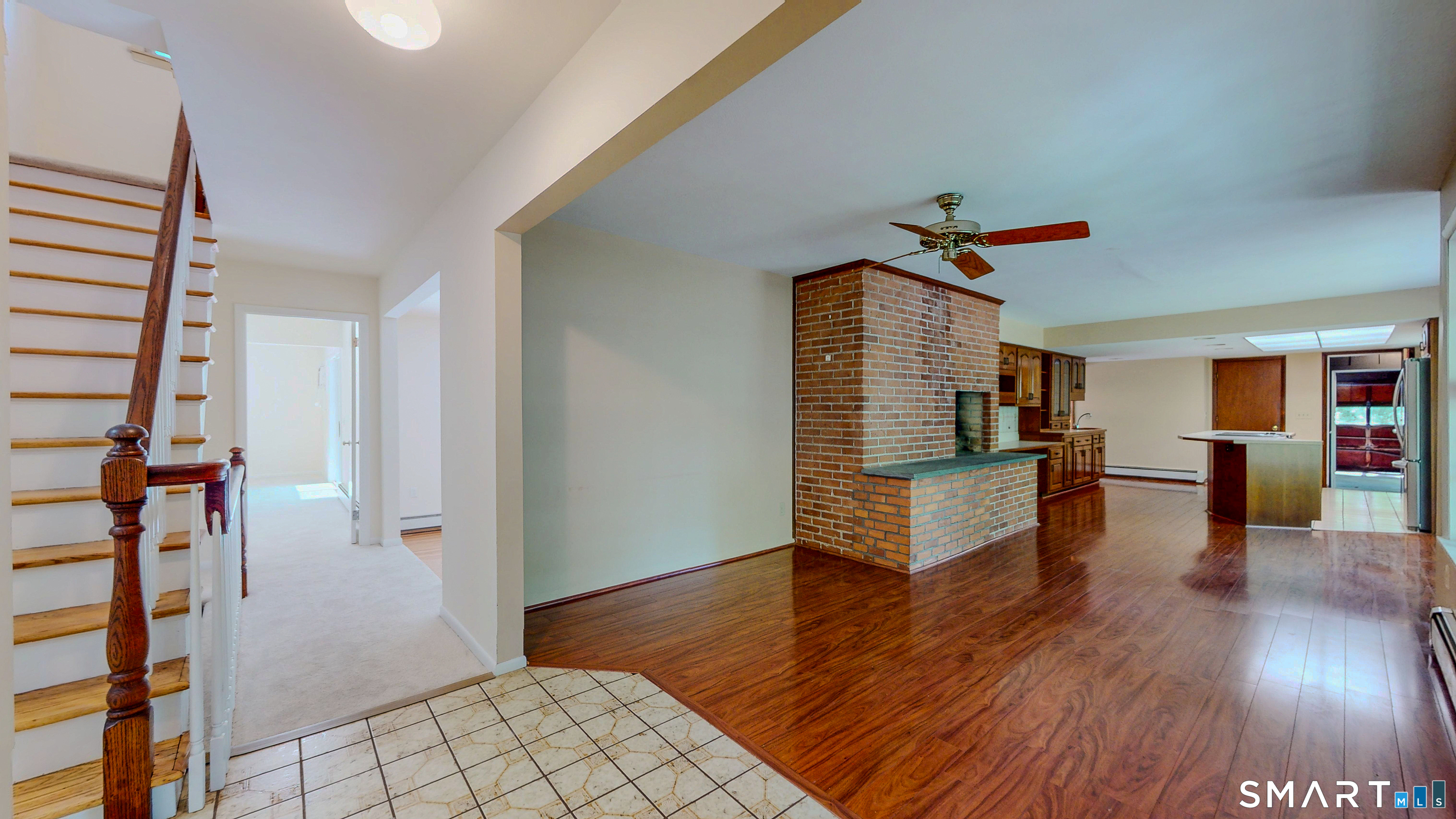 133 Chambers Road Danbury, CT 06811 - Photo 9 of 30 a living room with furniture and a wooden floor