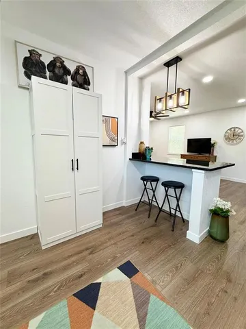 a workspace with furniture and window