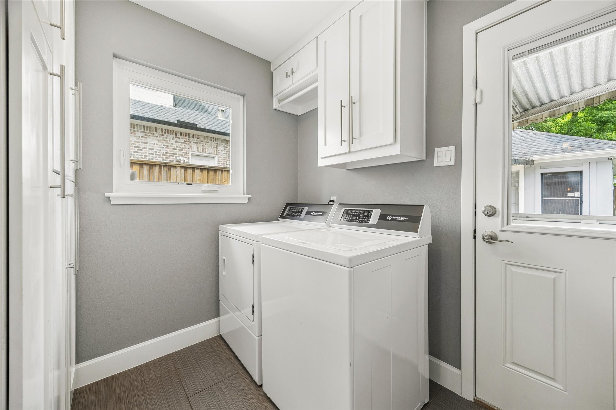 1018 Ben Hur Drive Spring Valley Village, TX 77055 - Photo 22 of 30 The laundry room features a drying bar and ample storage.