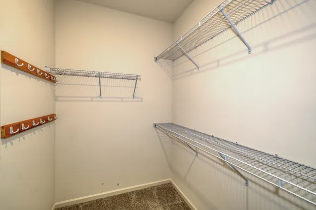 a view of a room with racks on the wall