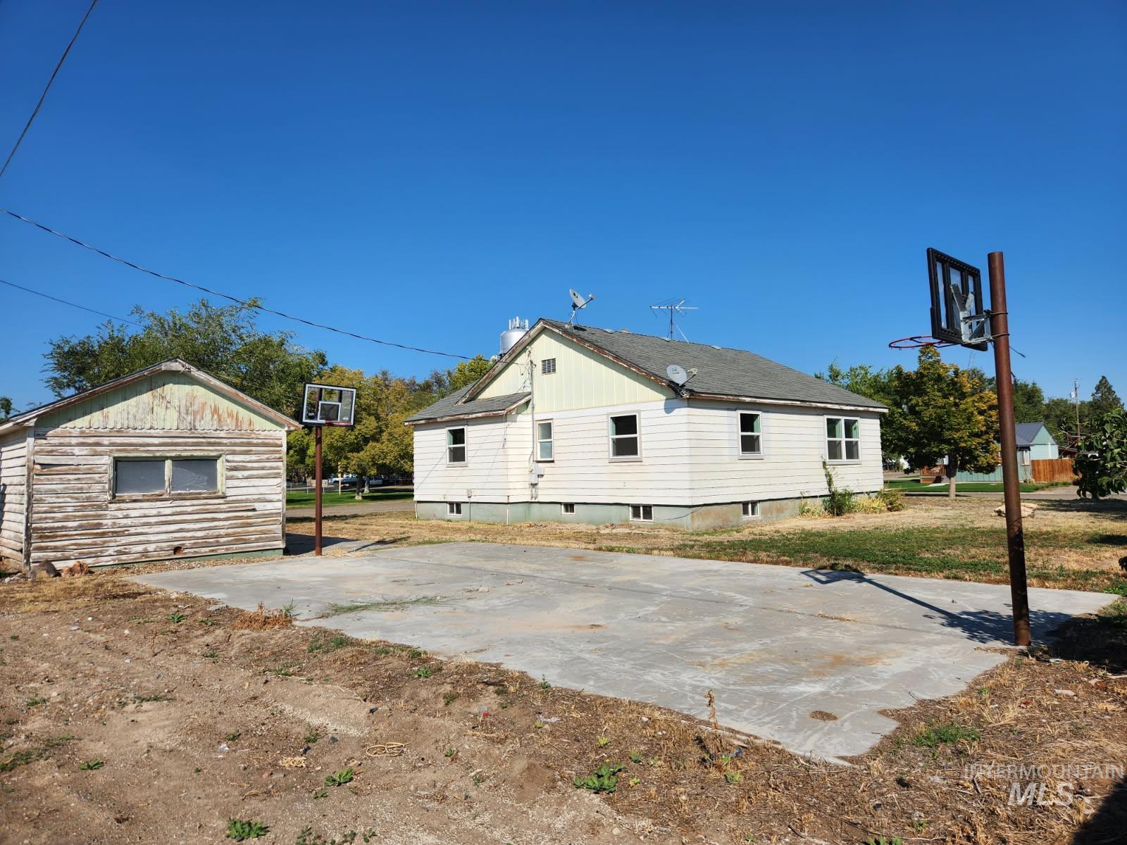 525 North 4th Street Nyssa, OR 97913 - Photo 17 of 17 Rear view of house featuring an outdoor structure