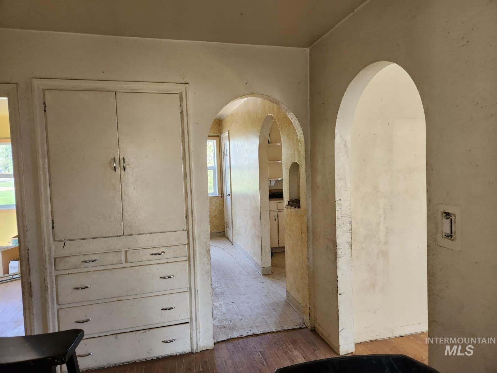 525 North 4th Street Nyssa, OR 97913 - Photo 7 of 17 Hallway with wood-type flooring