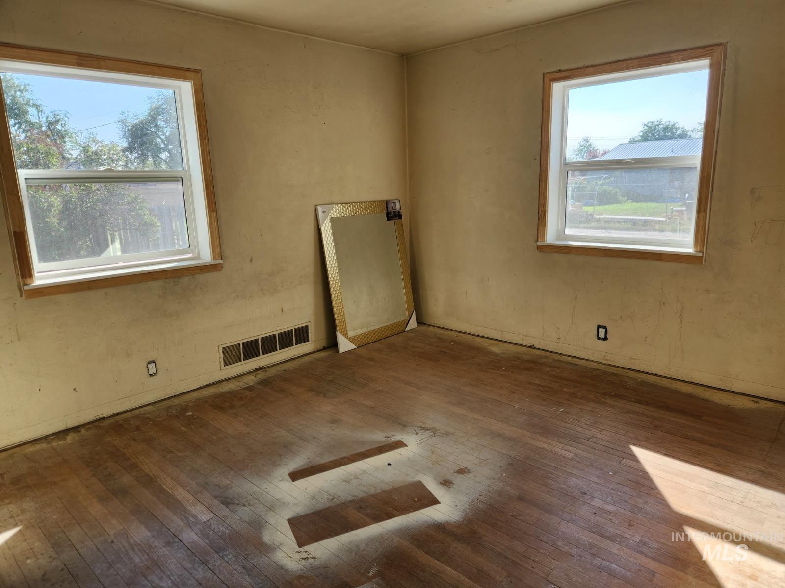 525 North 4th Street Nyssa, OR 97913 - Photo 10 of 17 Spare room with hardwood / wood-style floors and baseboards