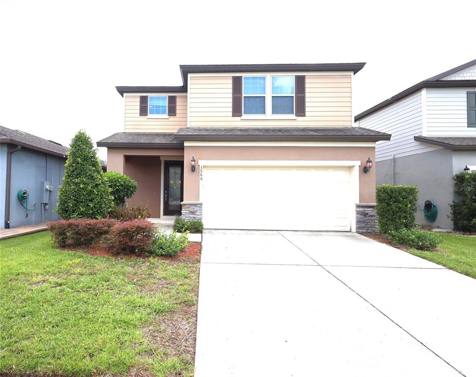 a house view with a outdoor space