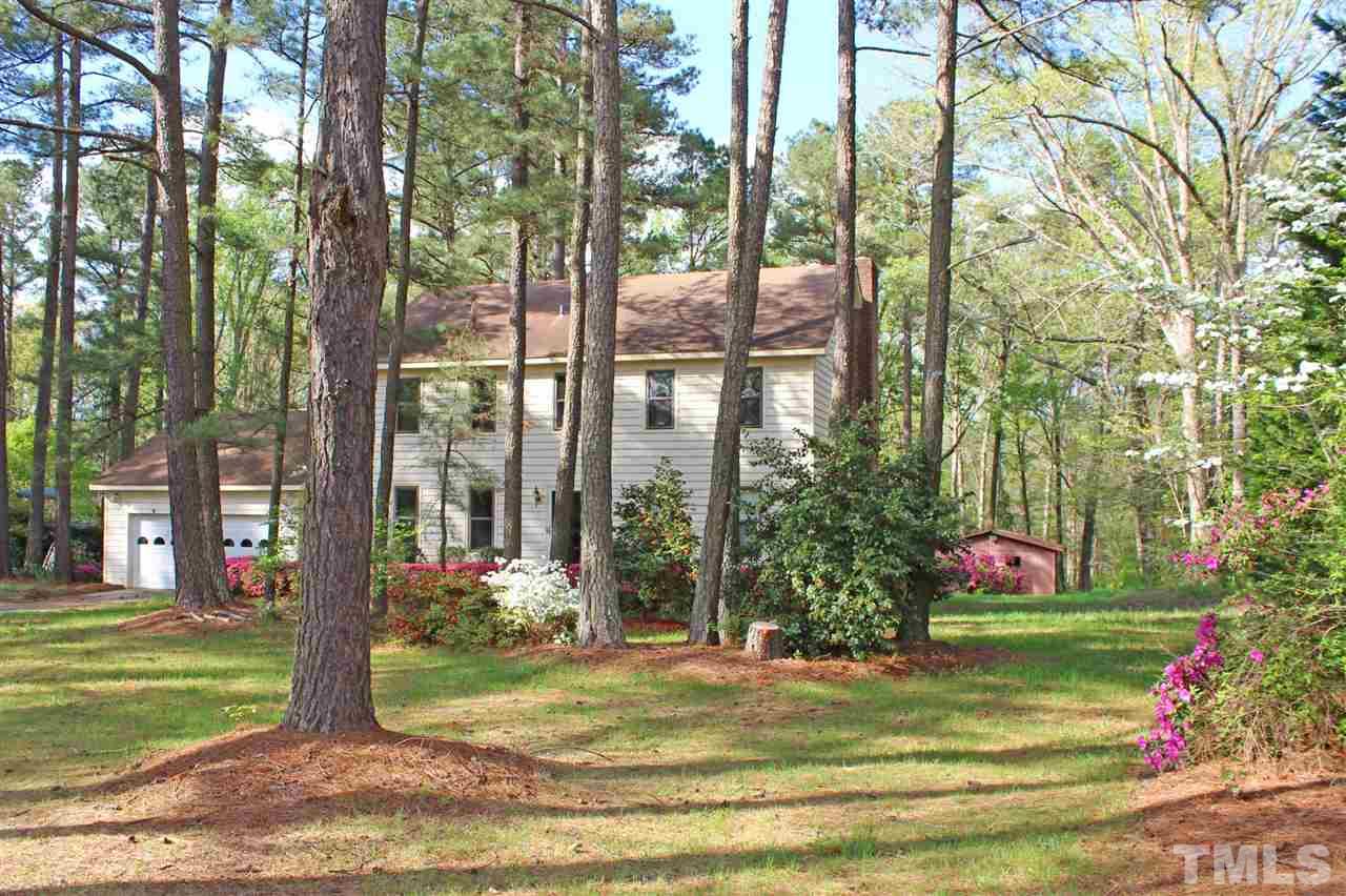 3300 Manor Ridge Drive Raleigh, NC 27603 - Photo 1 of 25 Timeless 2-story nestled on 1.03 acres, park-like setting.